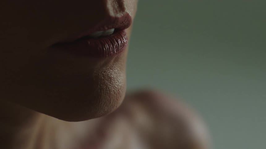Close up of a womens mouth slightly opened