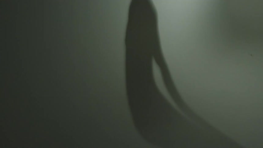 Abstract footage of a shadow of a person