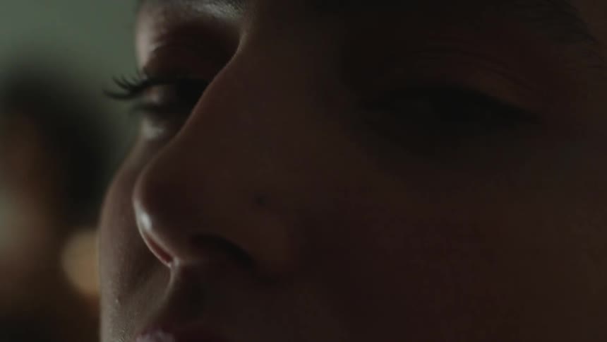 Close up of female models face with piercing in the studio