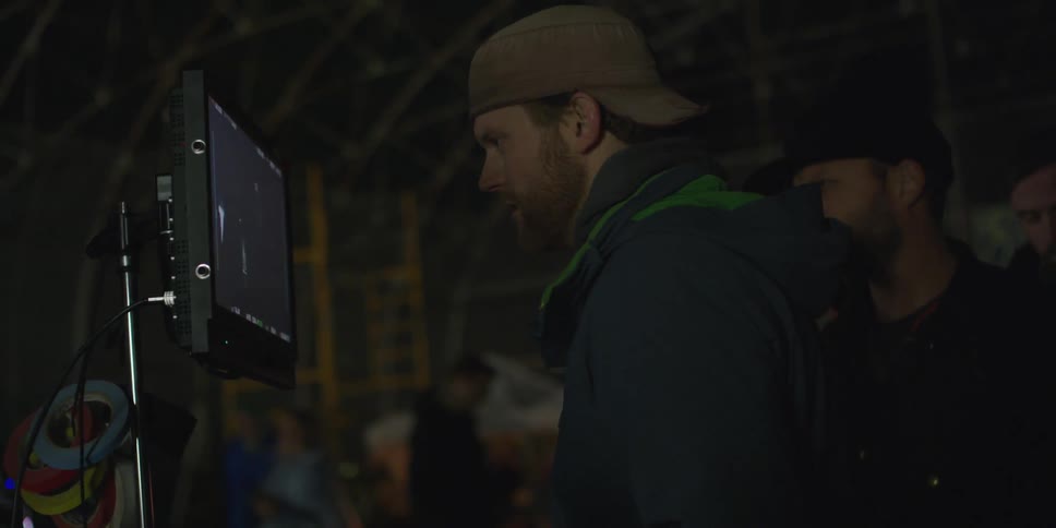 A film crew works at night
