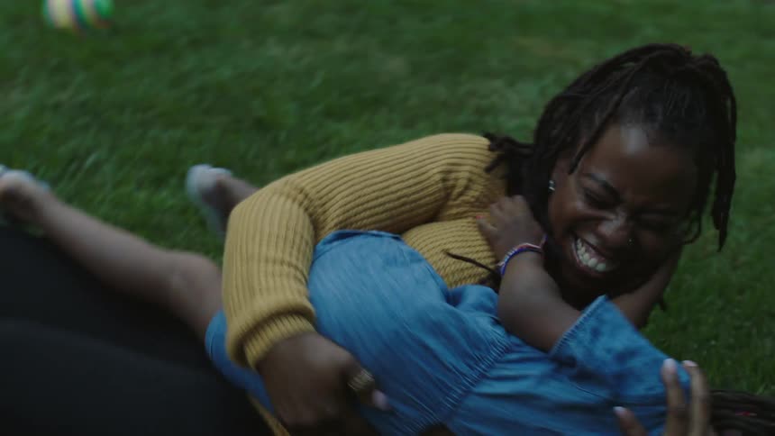 A child runs into her mothers arms