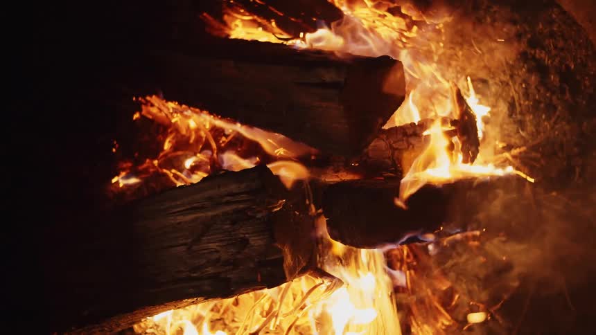The logs are burning in the fire