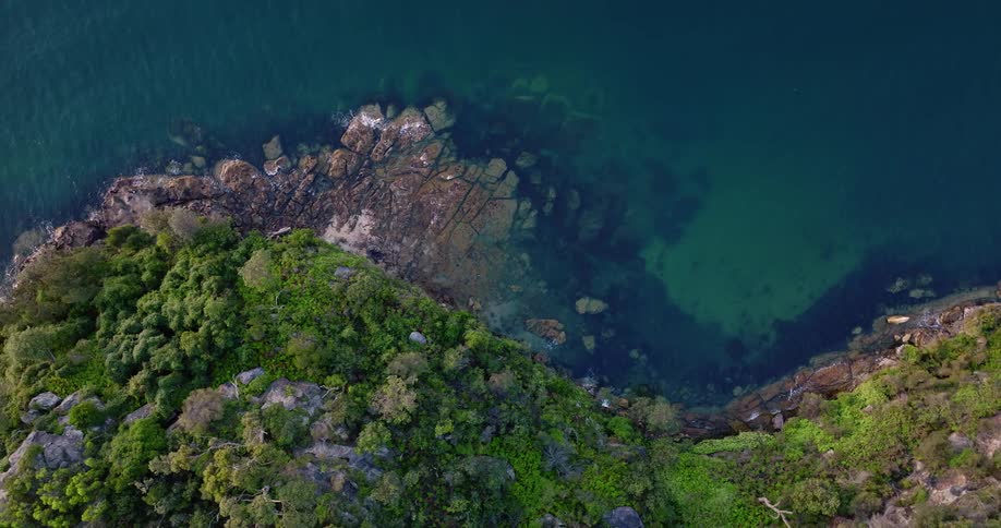 The blue water surrounded the island shore