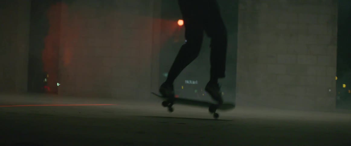 Young man practicing skate in an empty space at a building