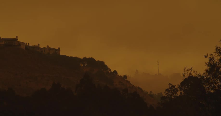 There are homes on top of the hill
