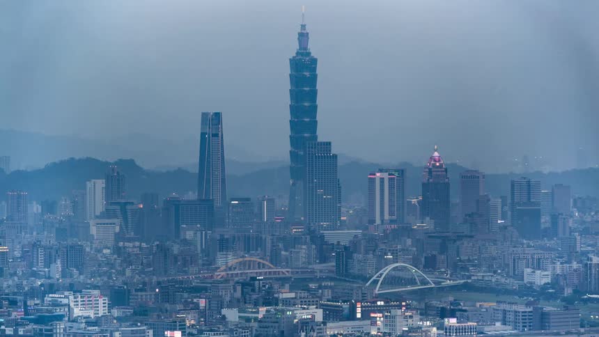 Time lapse view of an urban city is displayed