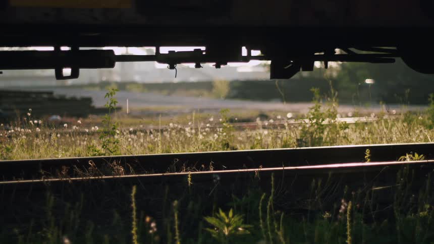 Water leaking from a metal pipe in a field