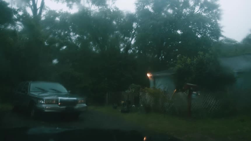 Heavy rain pours in the yard