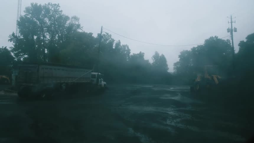 A view of a storm raining outdoors