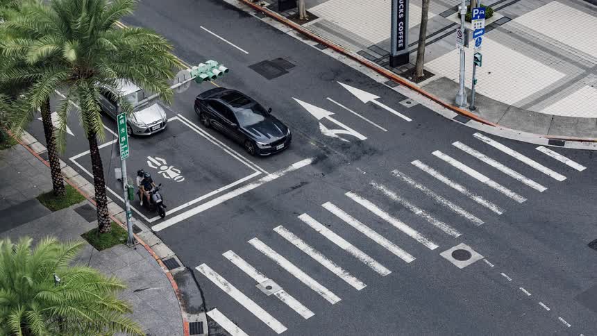 Time lapse view of cars and pedestrians in a city