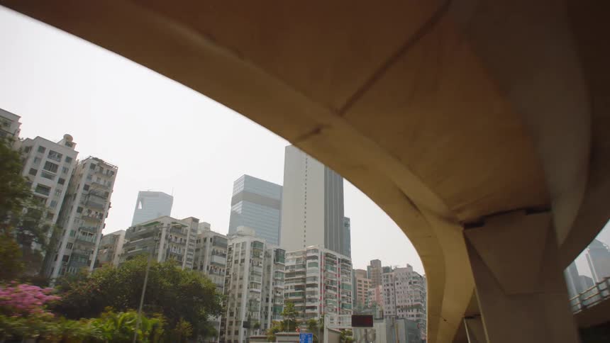 Cars and high rise office and apartment buildings in a city