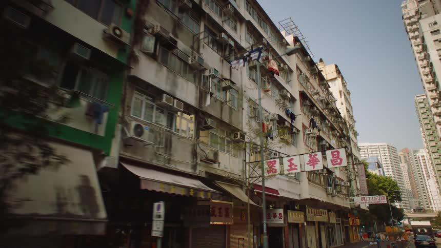 Footage of small apartment buildings on a chinese city at morning