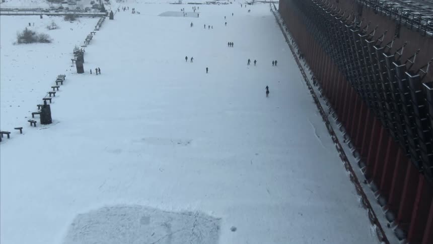 People are walking in an arctic area