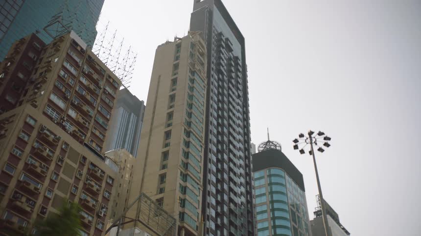 Balconies line the outside of downtown apartment buildings