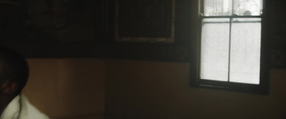 Male dancer dances in empty room of a home