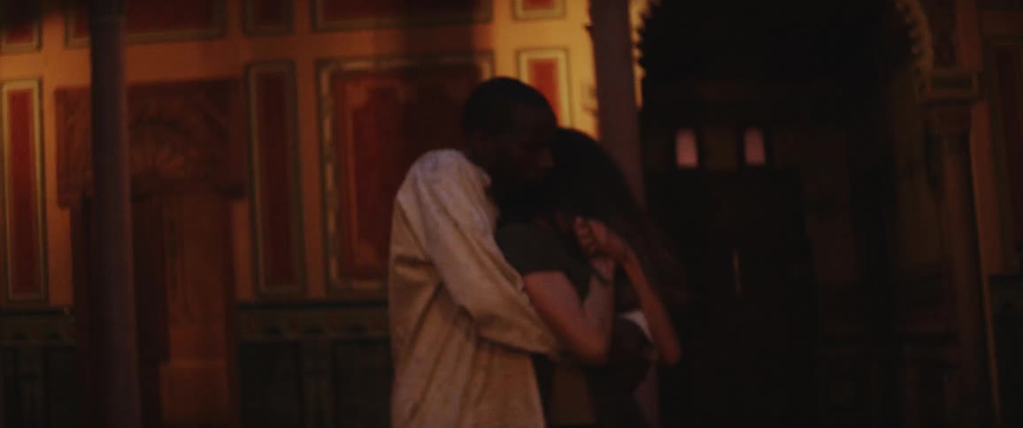 A man and woman dance in the hall