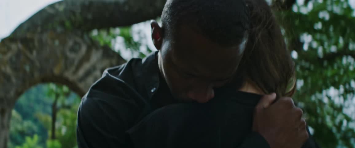 Boyfriend and girlfriend are hugging outdoors in spring