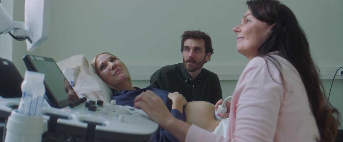 A woman is having a sonogram
