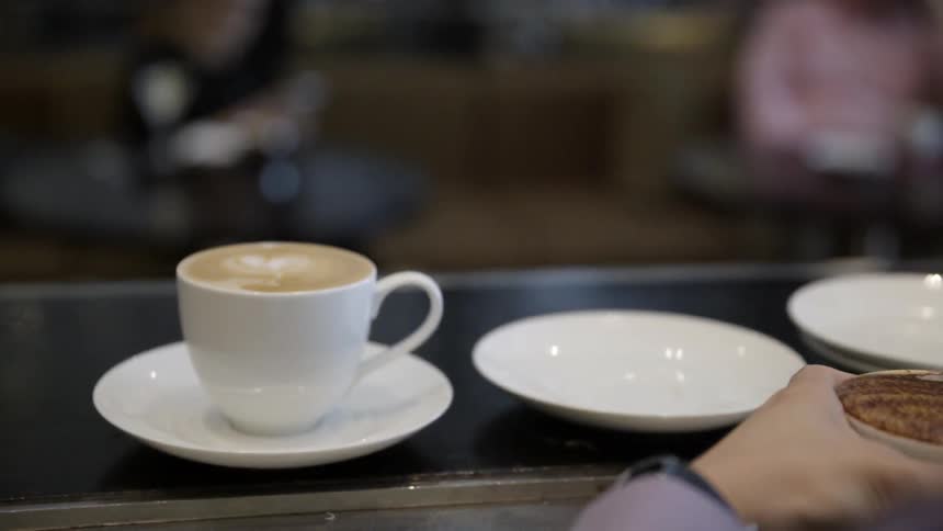 Mugs are placed on platters