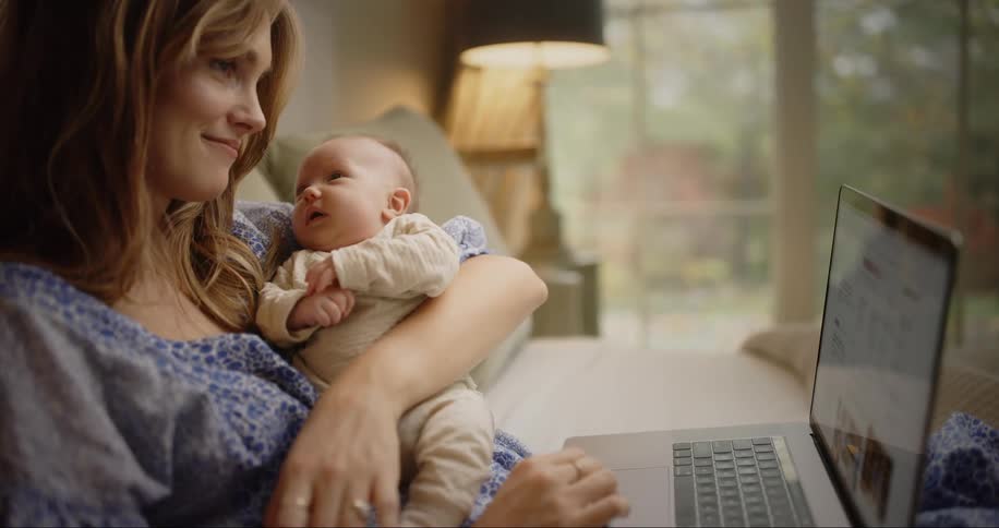 Young mother with smiling baby