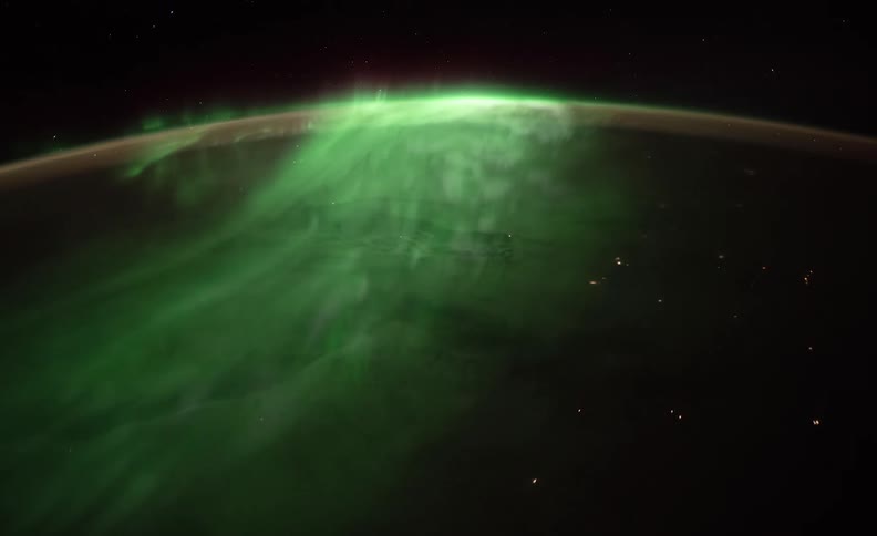 Aerial of the northern lights across the sky at night