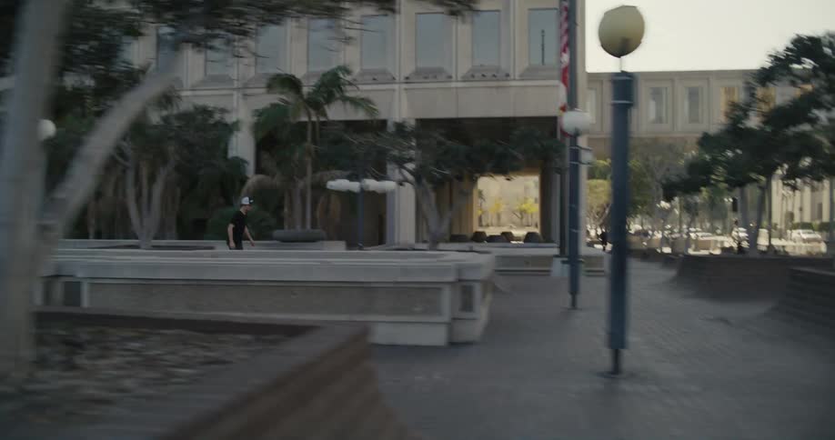 A man skateboarding outdoors in a city