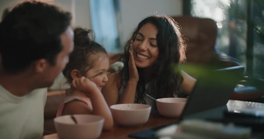 A family eating and talking together