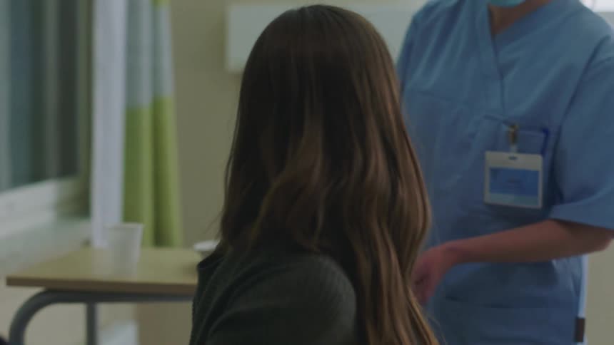 A patient is woken up to take medicine