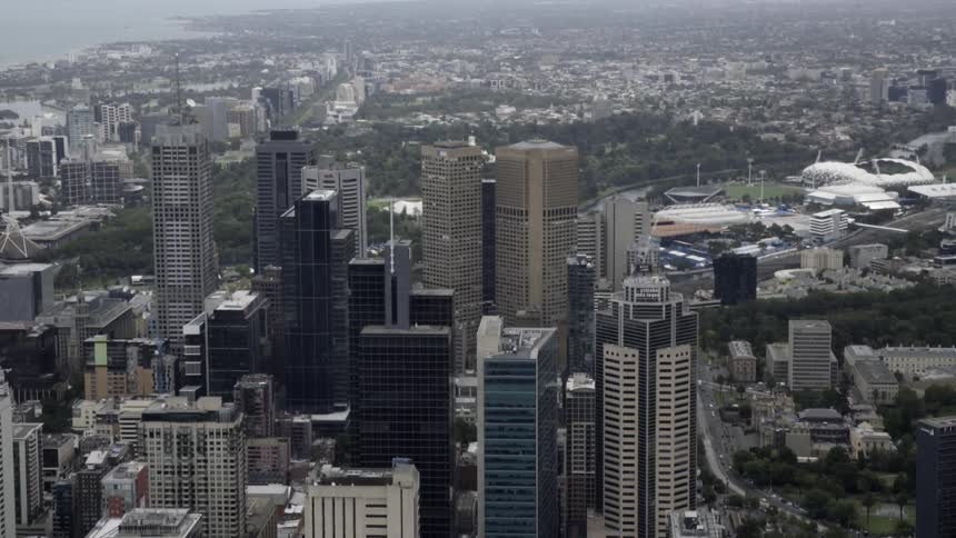 Aerial view of a city with tall buildings