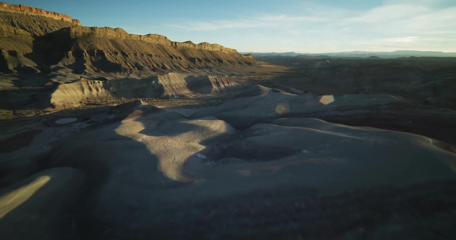 An aerial view of a landscape with a canyon