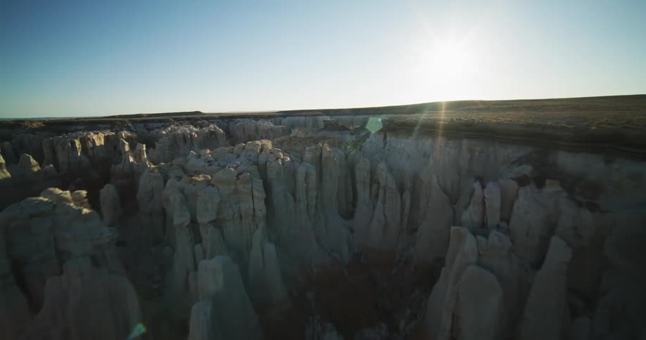 Aerial view of canyons and valleys are displayed at dusk