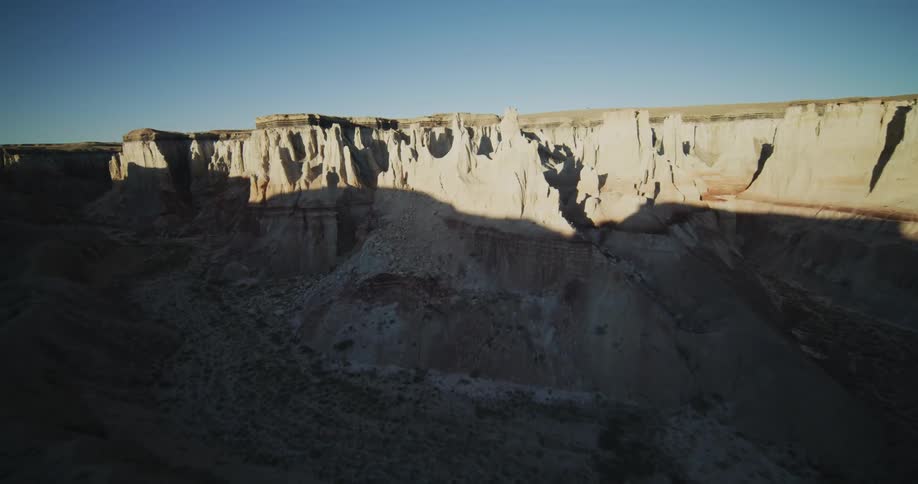 Tall narrow peaks in a canyon create the appearance of a plateau