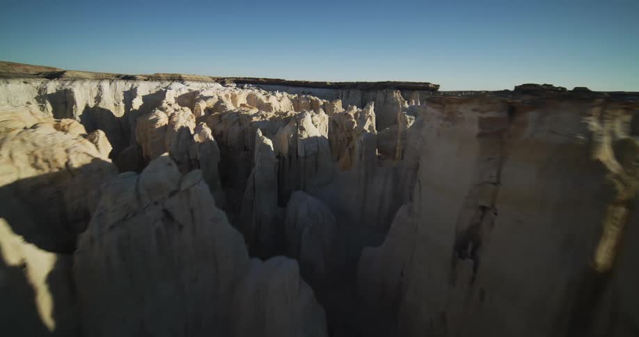 Aerial view of canyons and valleys are displayed during the daytime
