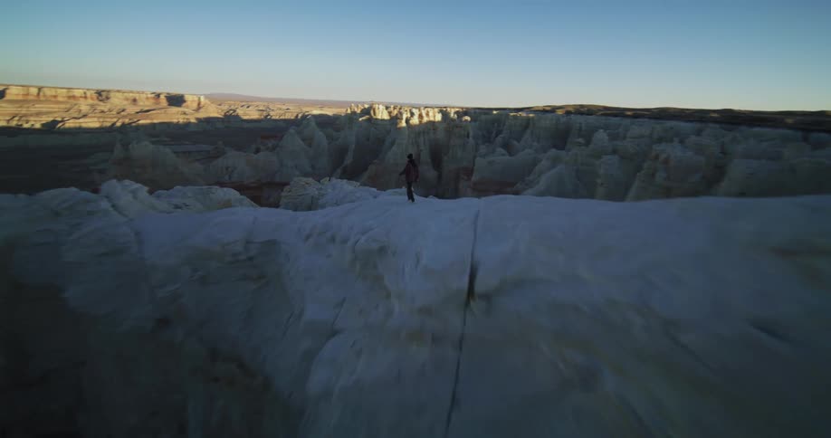 A person hiking on a cliff