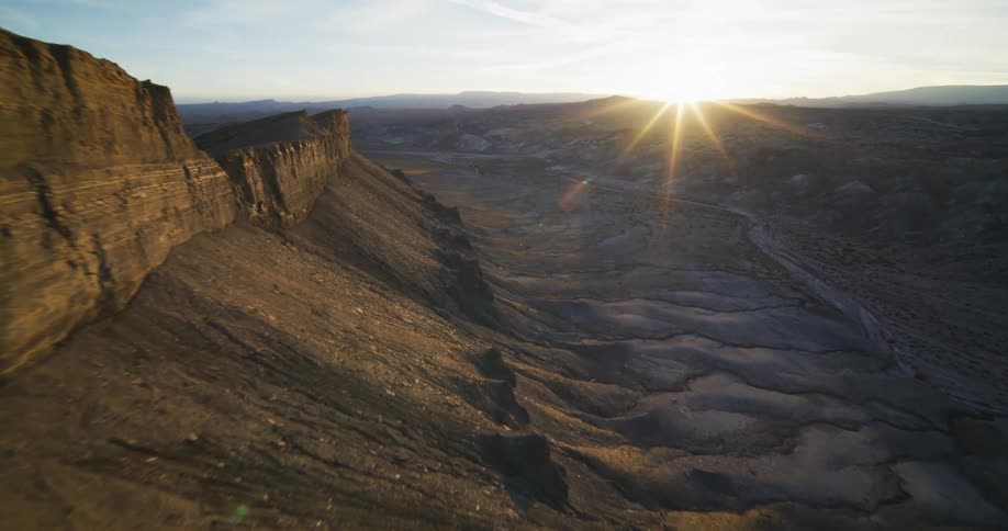 Aerial view of a valley is displayed at dusk