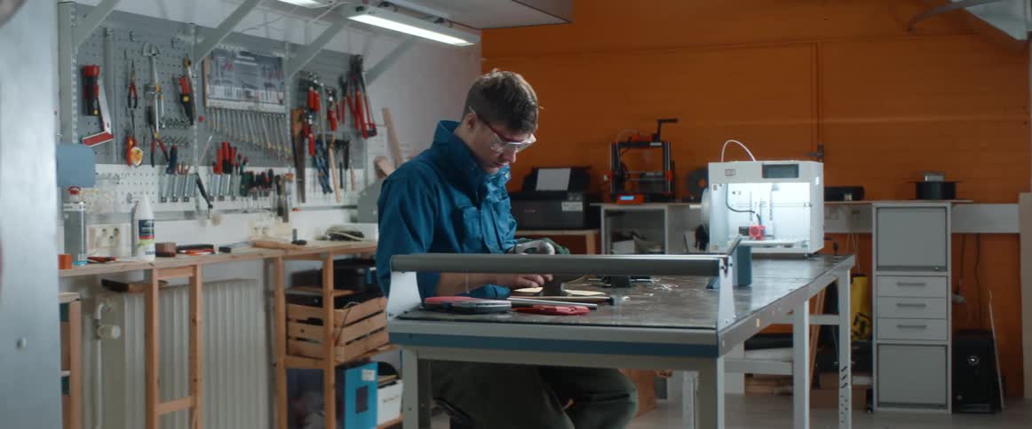 A man is working in a laboratory alone