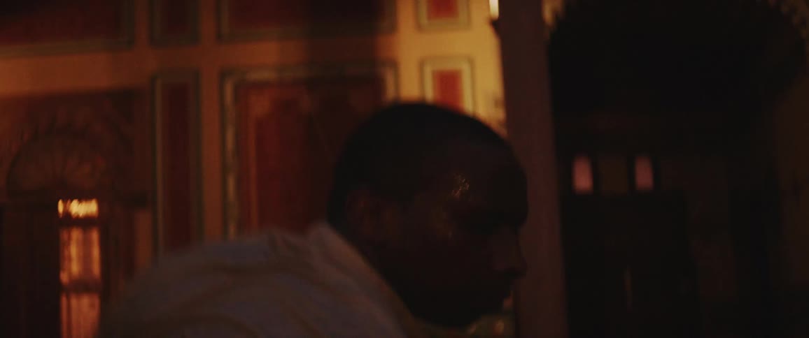 A man is soaking wet as he dances