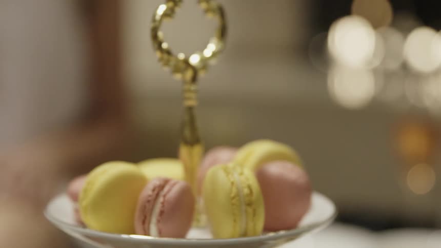 Pastries are on two layers of a platter