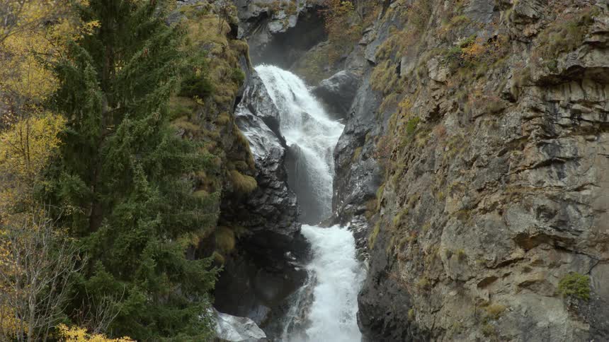 White water flows down a steep slope over rock