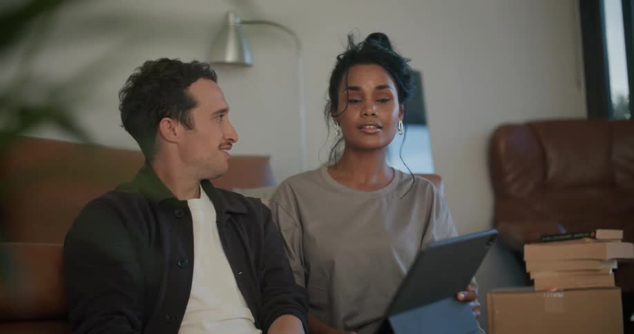 A man explains his idea and vision to his client and is happy when she nods in agreement