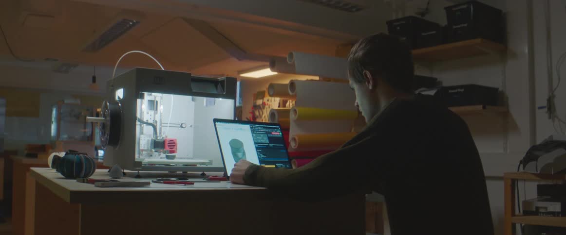 A man is working on his laptop