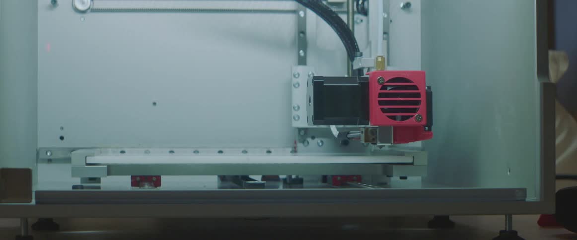A 3d printer is building something
