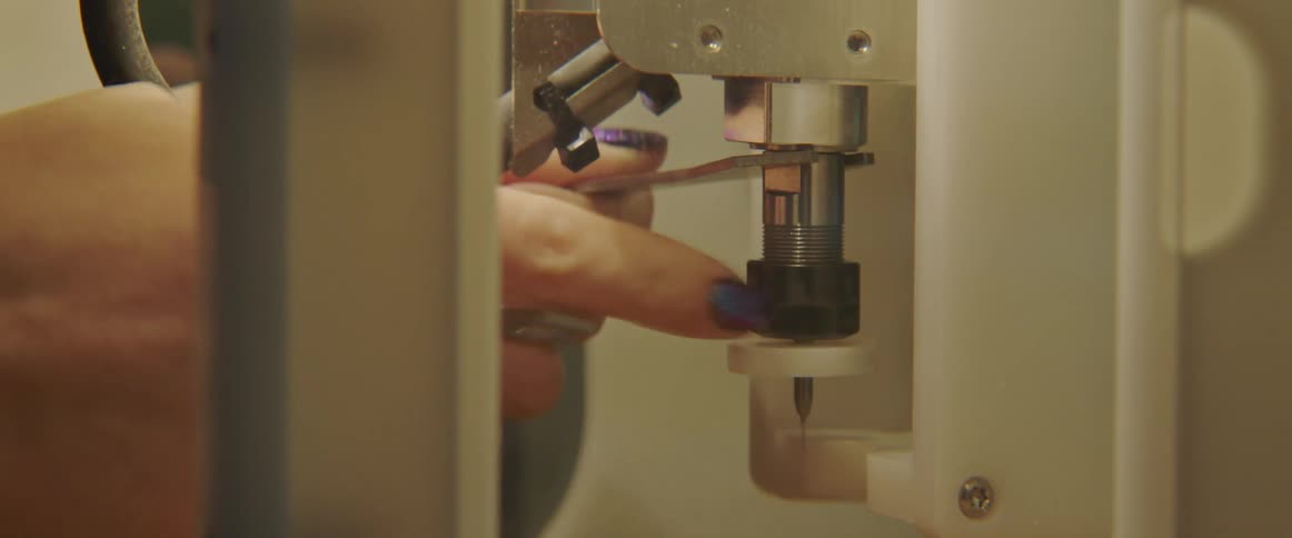 Person removes head of machine