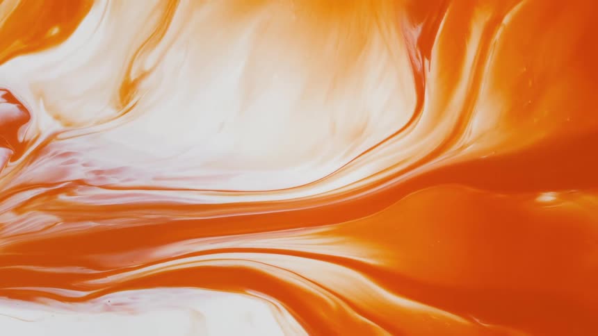 Abstract orange liquid flows