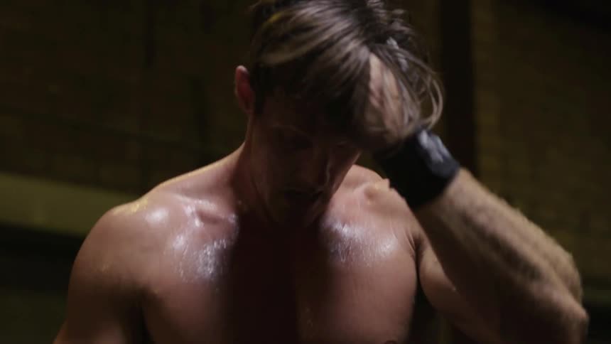 A man is sweating and moving around