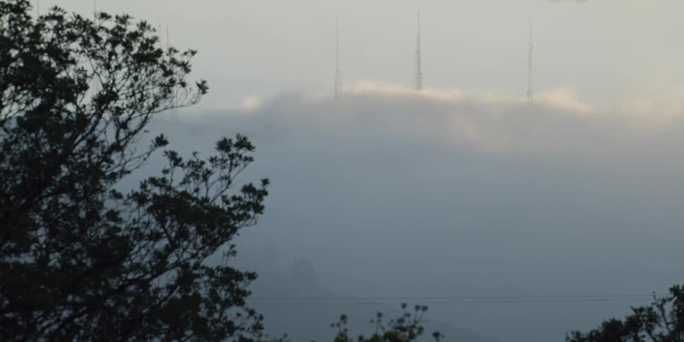 Dense fog sits over a town