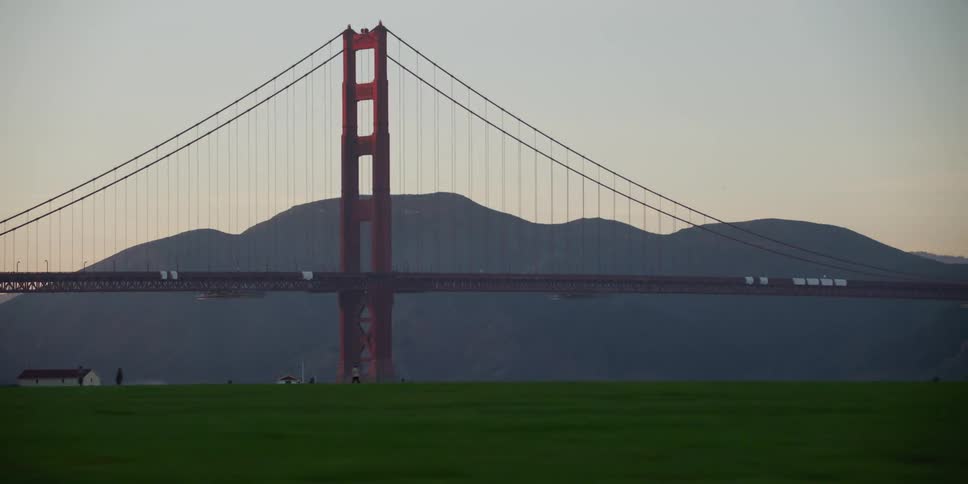 People walk in the park near the golden gate bridge