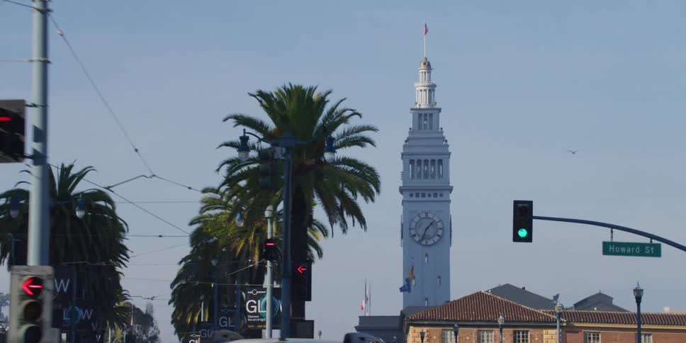 Driving towards the san francisco ferry building clock tower at morning