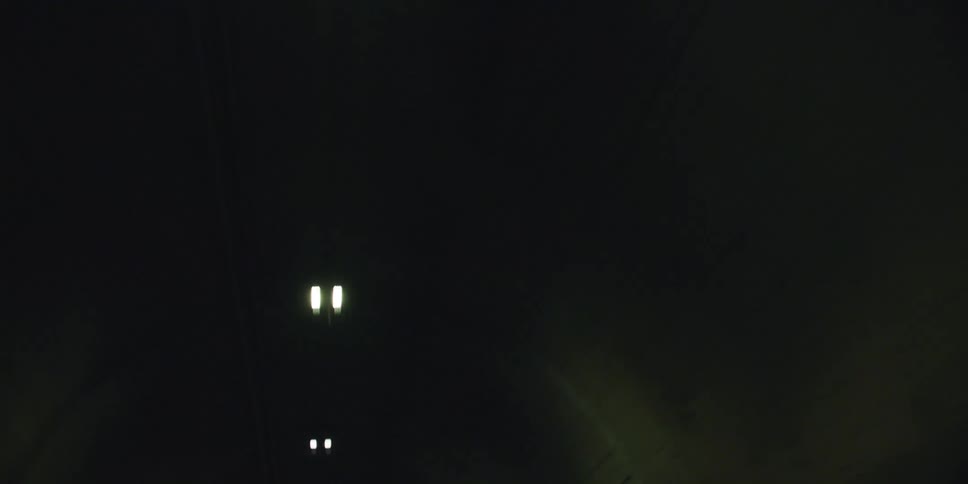 Driving to end of the tunnel watching lights above