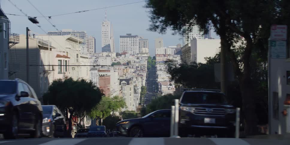 Driving on a street in a san francisco neighborhood at morning